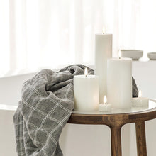 Load image into Gallery viewer, Uyuni Flameless Tea Lights and Pillars create stunning bath time ambience