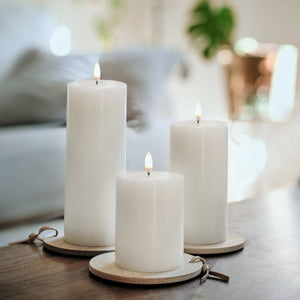 Trio of Uyuni flameless pillar candles on a table