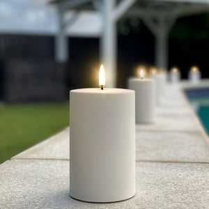 Outdoor flameless candles by the pool